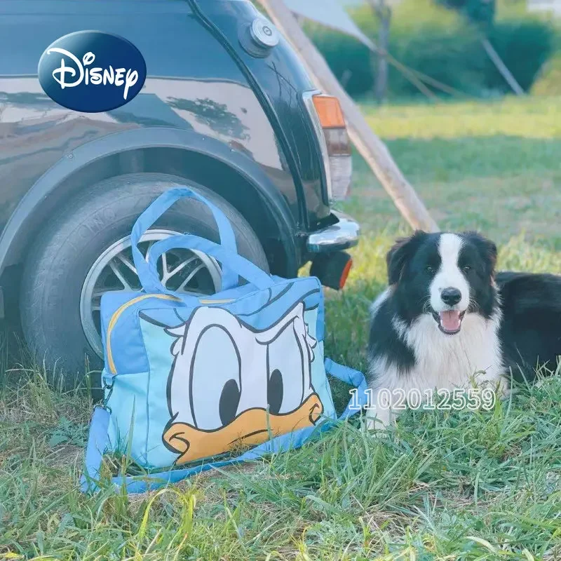 Фото Новая Женская дорожная сумка Disney «Дональд Дак», мультяшный портативный дорожный мешок, вместительная водонепроницаемая сумка для хранения №3