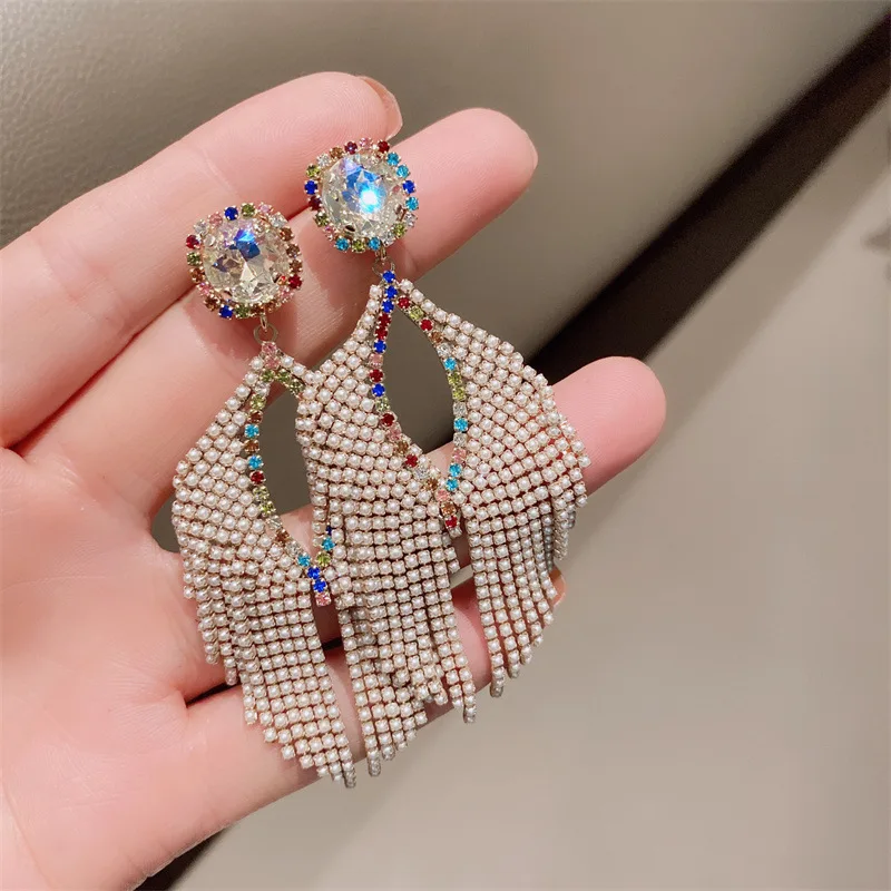 

Fringed earrings Hand woven Retro Water droplet Hollow out Beading Simplicity Bohemia alloy ma'am Rice bead earrings