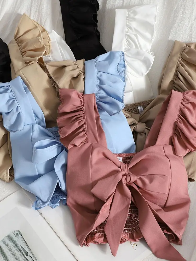 

Женский однотонный топ на тонких бретельках, с оборками