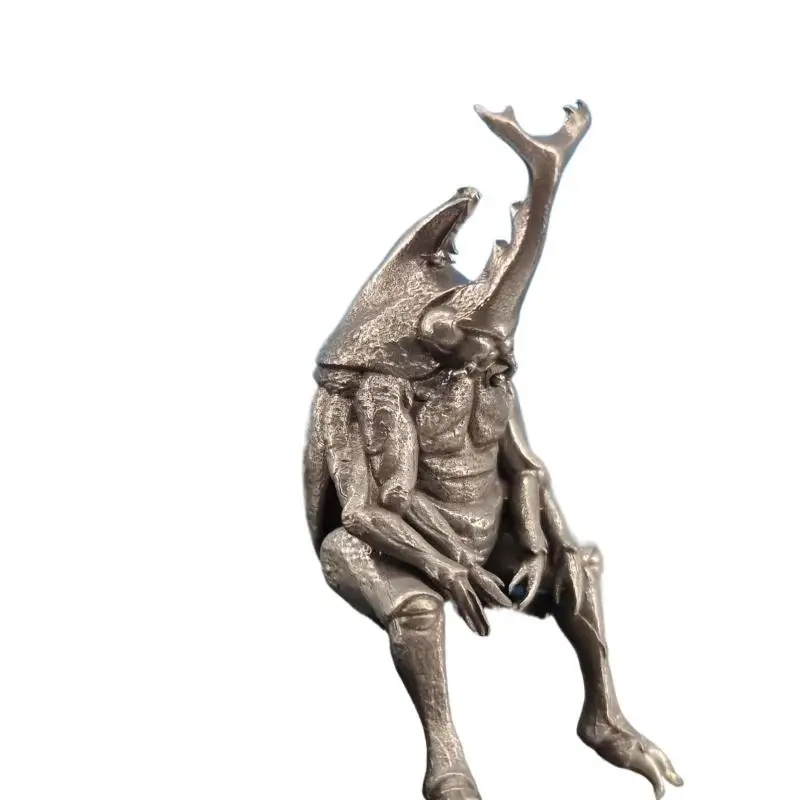 

Антикварная медная статуэтка жука с двумя рогами