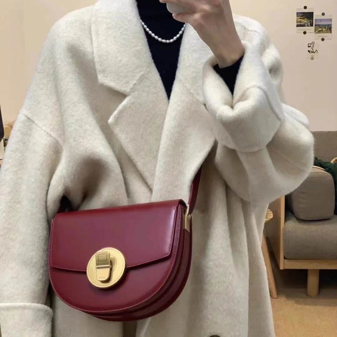 

New Peco Women's Round Buckle Saddle Large Can Series Light Luxury High Sense Messenger Shoulder Bag Leather