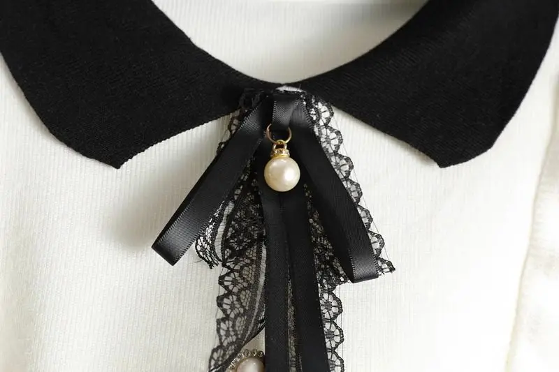 Пуловер с узелком-бабочкой и оборками по краю короткий базовый свитер облегающий