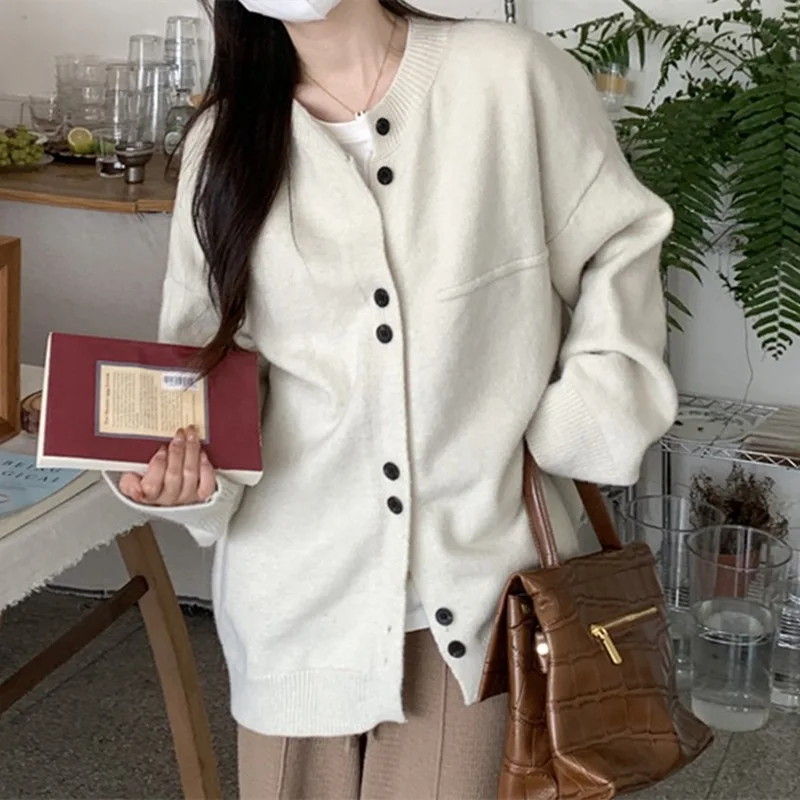 

Lazy design feeling round neck knitted cardigan for women's autumn and winter new solid color sweater top trend