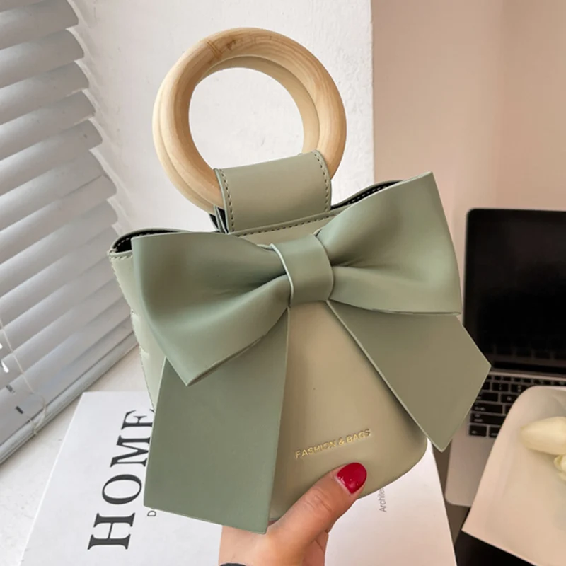 

Новые милые женские сумочки в форме бочонка с бантом, вечерний клатч, роскошные дизайнерские сумки через плечо из искусственной кожи, женск...