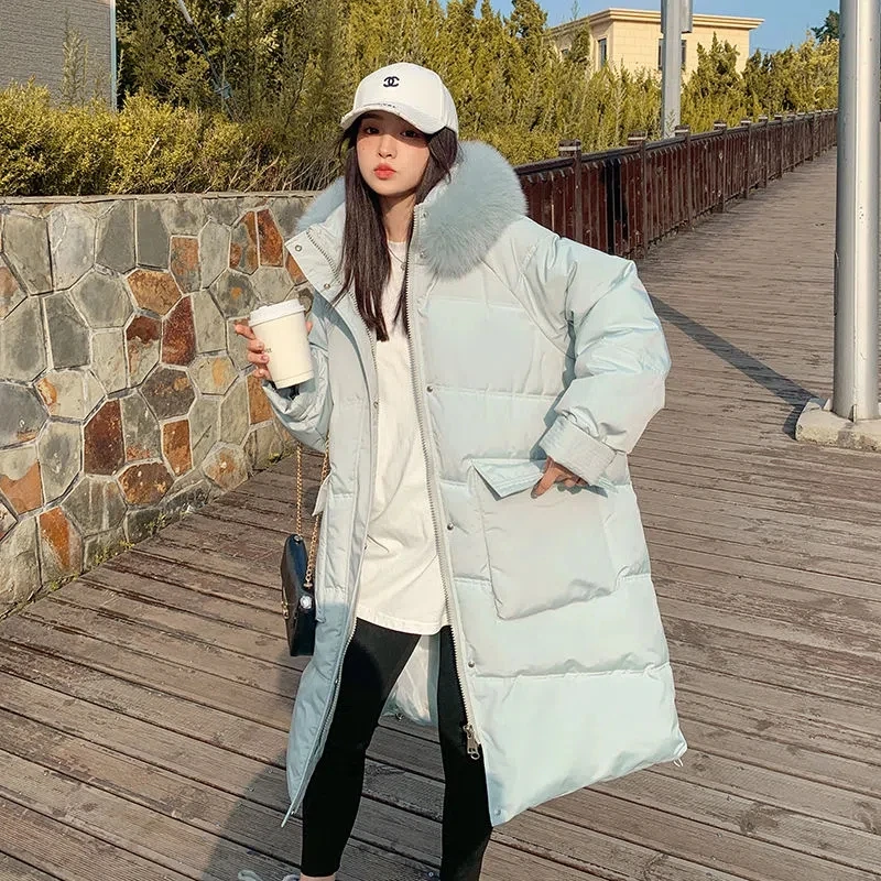 Женская длинная стеганая куртка с меховым воротником и капюшоном теплая зимняя
