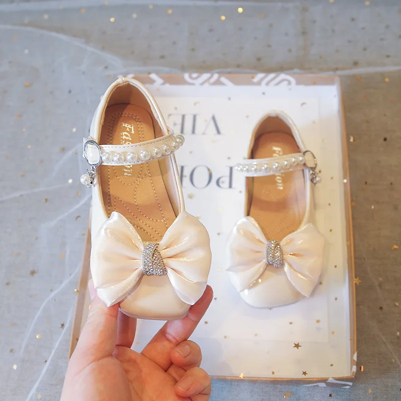 

Детские Нескользящие туфли принцессы, элегантные мягкие, с жемчугом и бантом, со стразами, модная обувь для выступлений