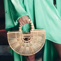 2022 summer new wooden bead woven handbags retro ladies fashion beach seaside vacation all match hollow natural color round bag