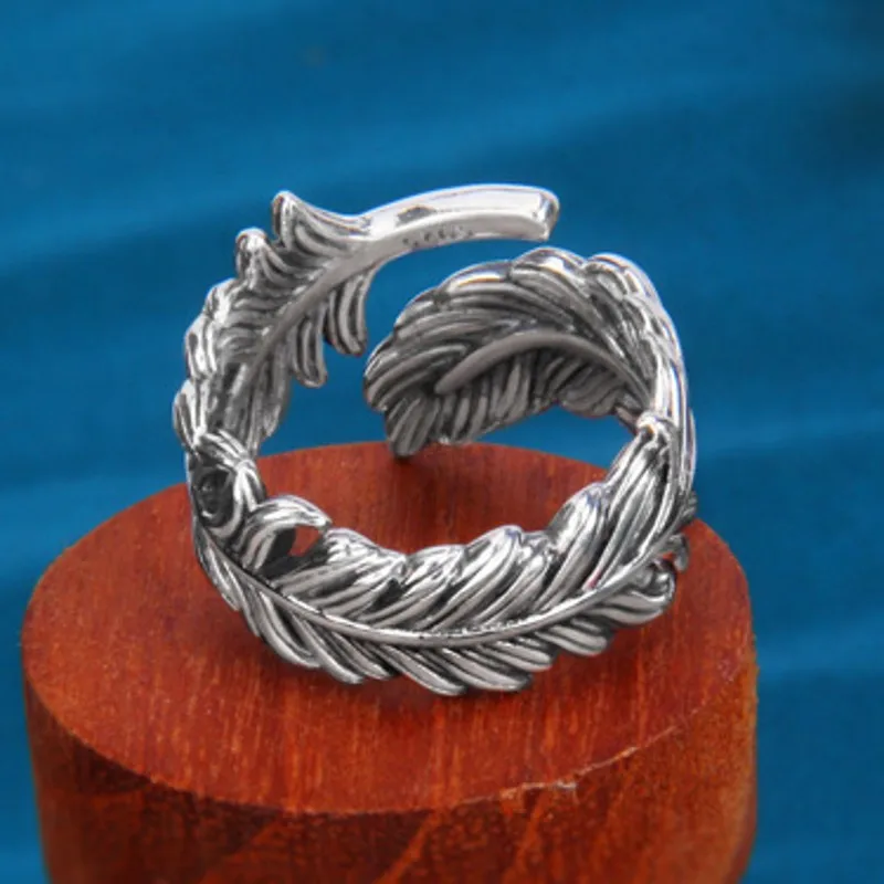 Мужское и женское кольцо из серебра 925 пробы с перьями