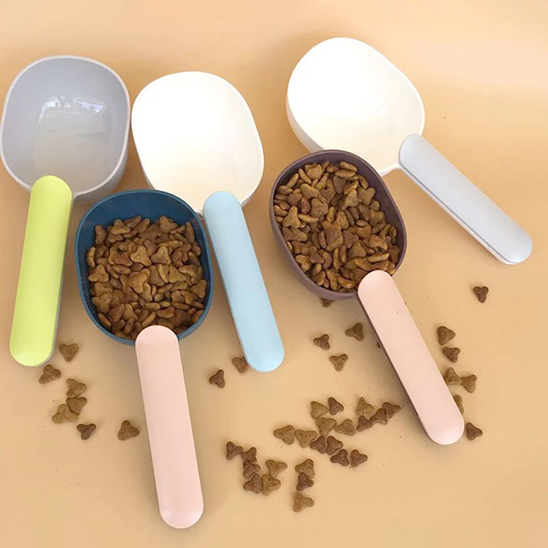

Многофункциональная ложка для кормления кошек и собак, ложка для кормления питомцев С запечатанным мешком, креативная мерная чашка, изогну...