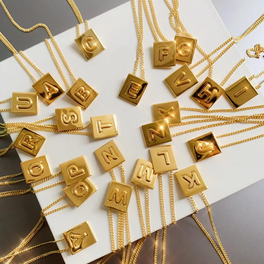 

Alphabet Brass Celi luxury Necklace And Bracelet with Gold Finish European American NE French temperament Arc de Triomphe women