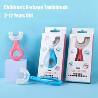 new hot sale 2 12 years old u shaped childrens toothbrush with handle silicone baby oral care u shape tooth cleaning brush