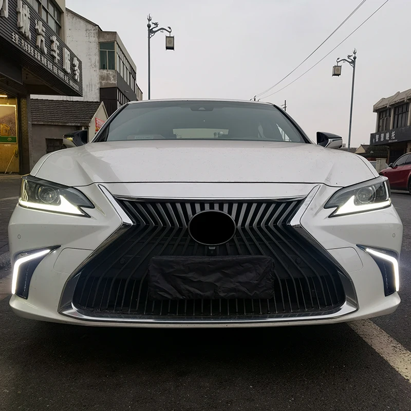 Фото Подходит для Lexus ES200260300350500 2018-2025 годов, фонарь переднего бампера, передняя противотуманная фара, дневные ходовые огни, аксессуары для указателей поворота №1