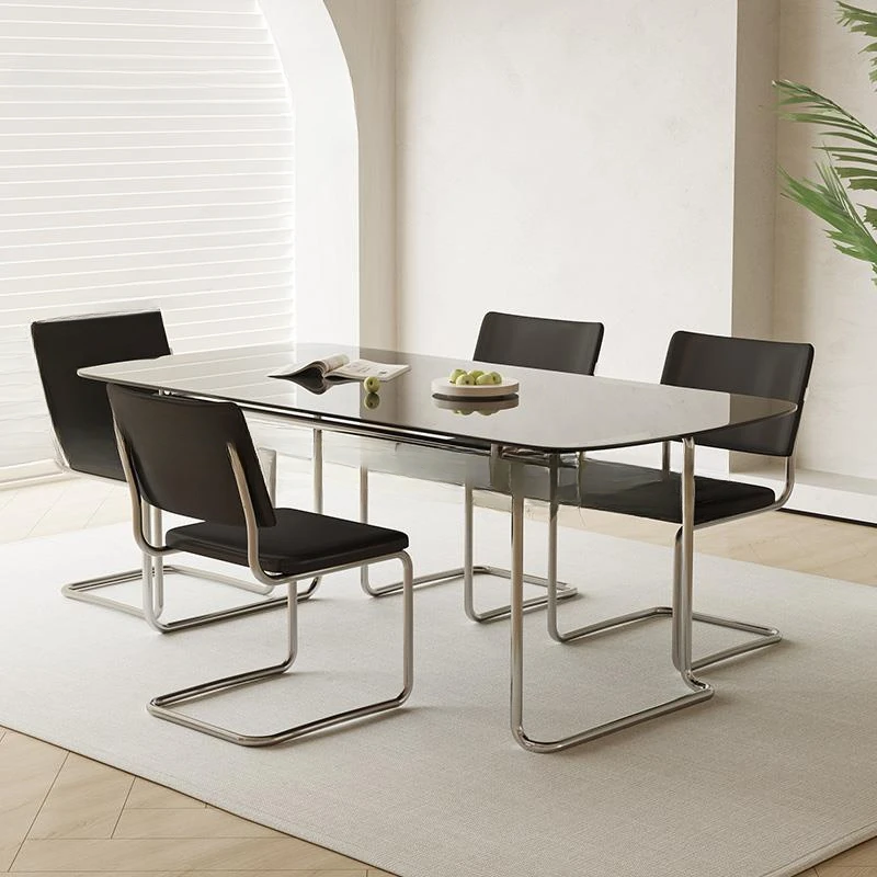 

Современный минималистичный обеденный стол в черном корпусе из нержавеющей стали