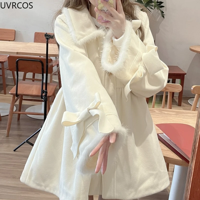 Женское шерстяное пальто с бантом