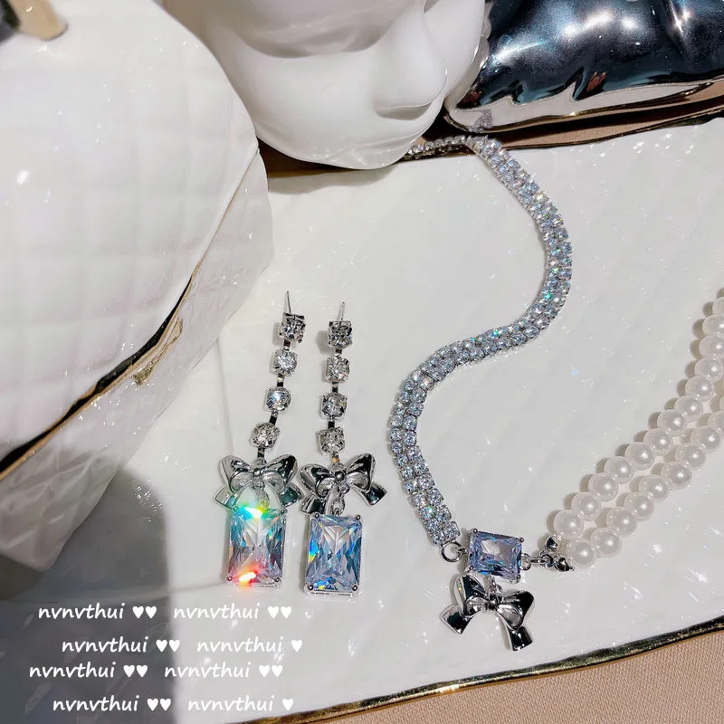 

Yingying Beads Bow Gem Earrings 18K Gold Plating Eight Hearts and Eight Arrows Bright Zircon Shining Diamond Earrings Necklace