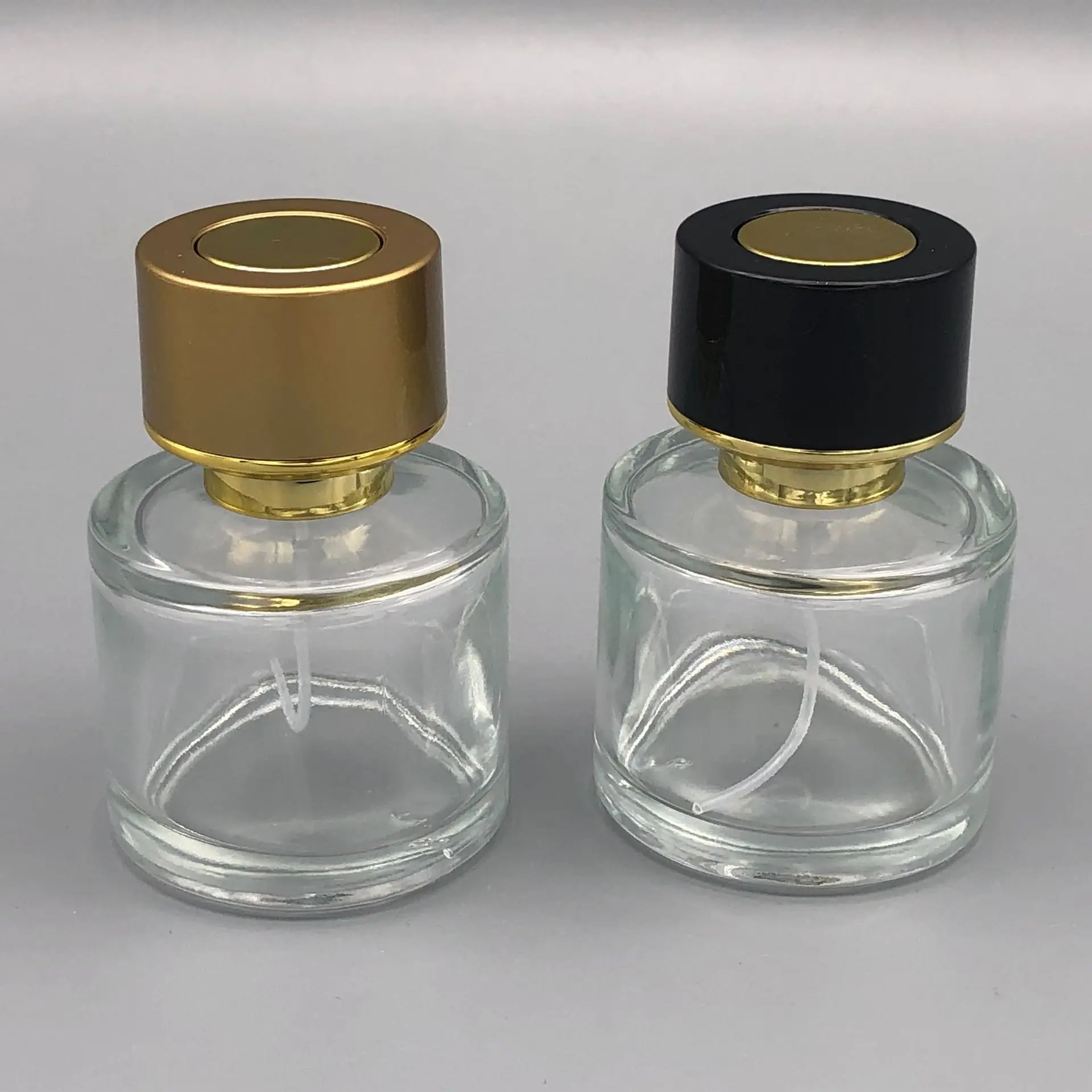 

50ml Empty Round Thick Clear Glass Perfume Bottle Black Golden Pump Senior Cosmetic Spray Refillable Bottle