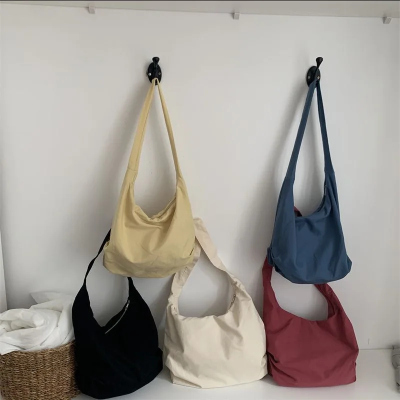 

Women's One Shoulder Canvas Large Capacity Japanese Simple Dumpling Commuting Tot Bag Shopping Student Diagonal Cross Body Bag