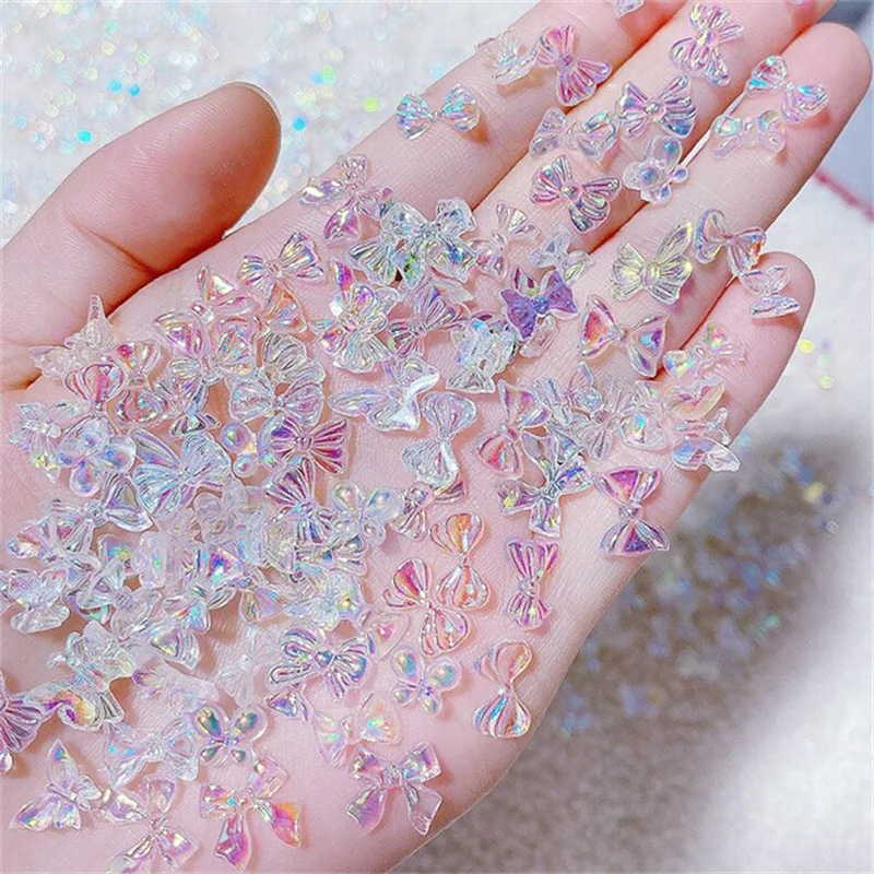 

20pcs Aurora Bowknot Love Nail Charms Multi Colors Nail Art 3D Flower Butterfly Decals Rhinestones For Manicure Nail Art Accesso