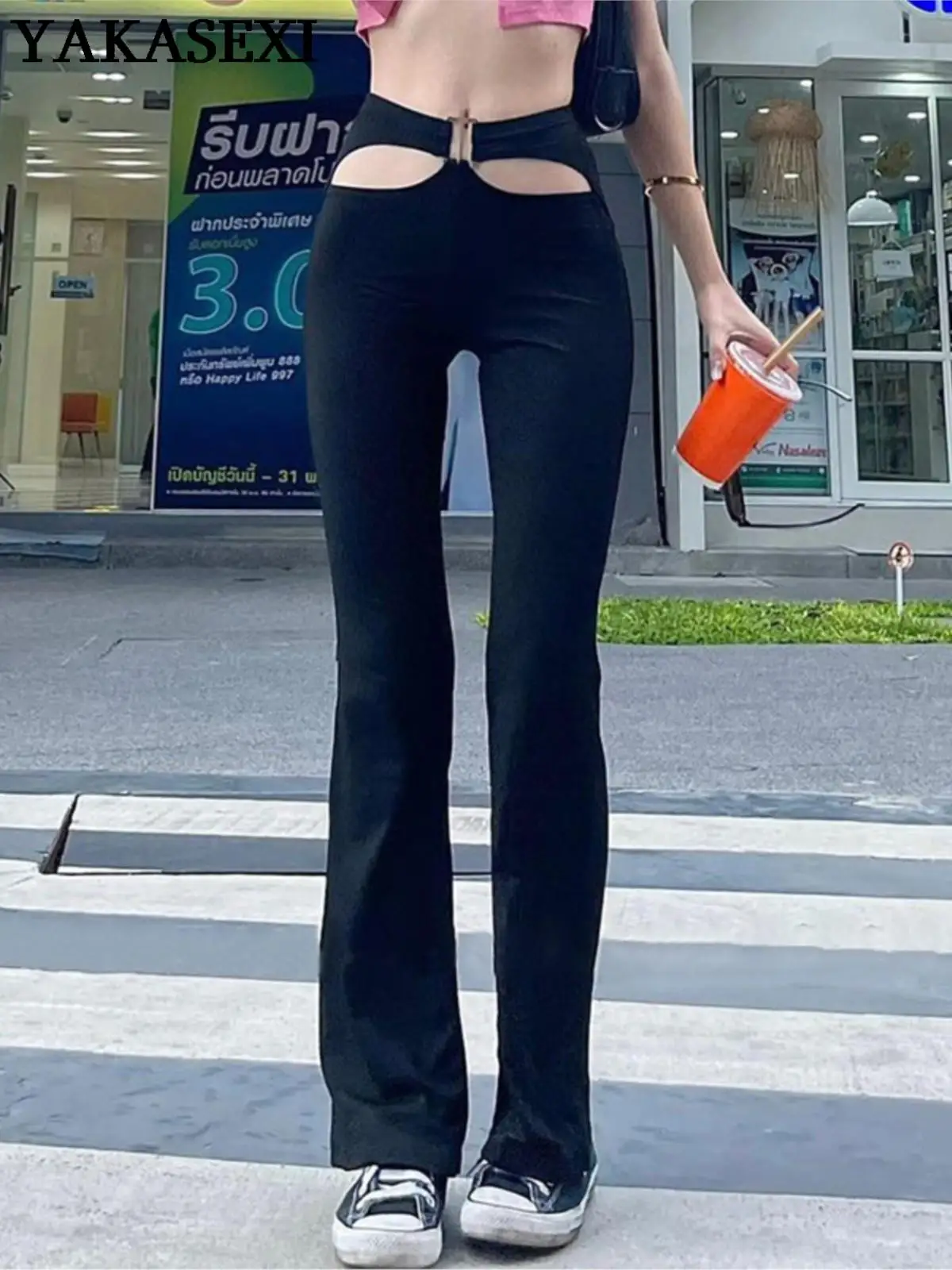 YAKASEXI 2022 Black Sexy Cut Out Holes Pants Women Hollow Out Streetwear Pants Metal Decoration Elastic Flare Trousers