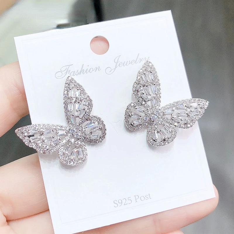 

Personality temperament butterfly s925 silver needle earrings everything with studded zircon net red earrings of the same style