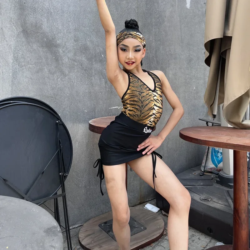 Фото Костюм для латиноамериканских танцев для девочек: топ и юбка с леопардовым принтом, для румбы, ча-ча-ча, самбы, танго, для соревнований и тренировок. №2