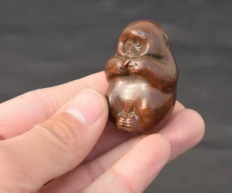 

Латунная статуя обезьянки