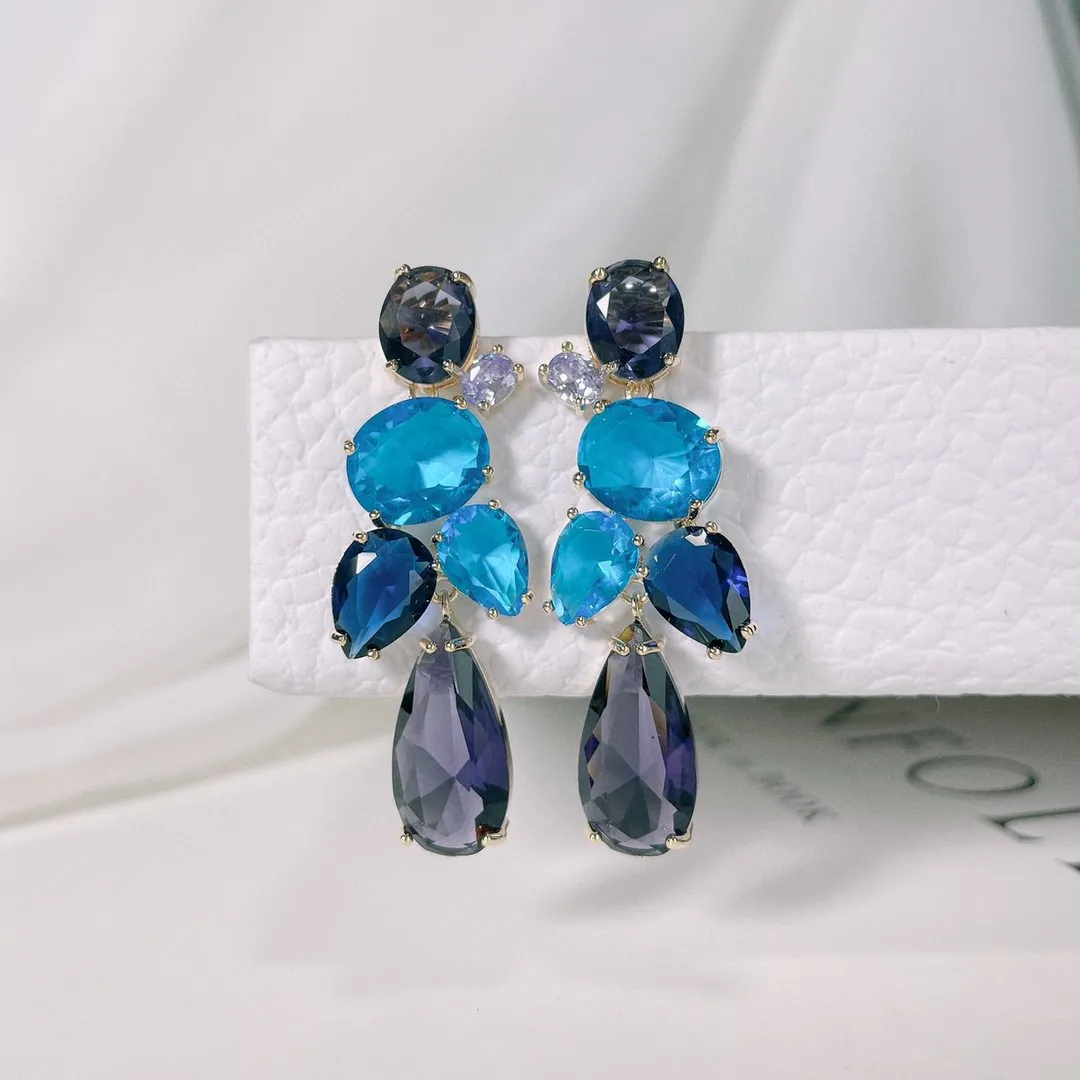 Длинные женские серьги-подвески с кисточками и фианитами