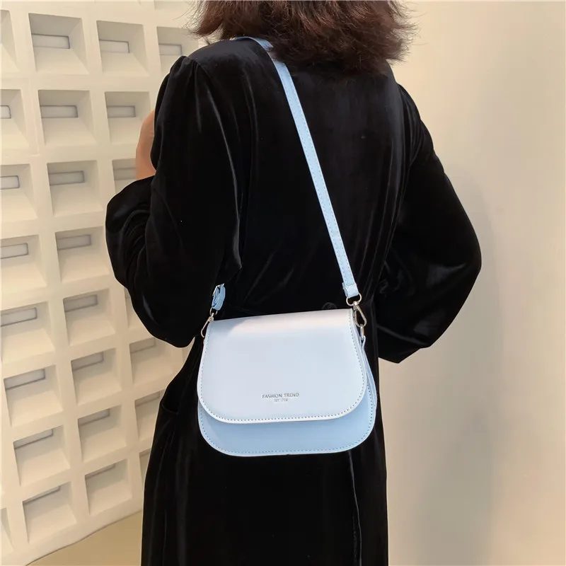 

2023 trendy women's saddle bag PU leather crossbody bag simple solid color flip over postman bag designer handbag