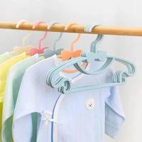 510 20pcs childrens small clothes hanger plastic windproof hook baby clothes storage rack support household cool portable