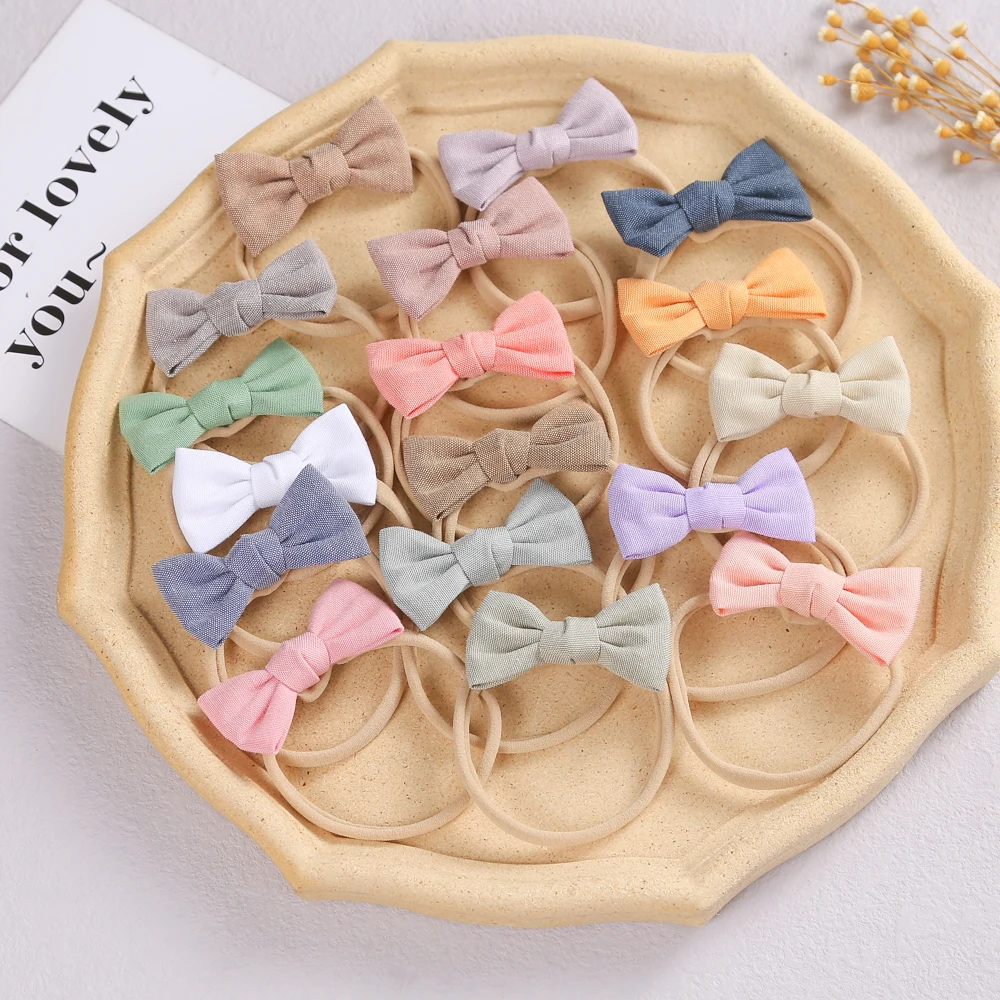 

Solid Color Bowknot Baby Hair Band New Nylon Child Head Headbands Soft Toddler Hair Accessories Elasticity Newborns Headwear