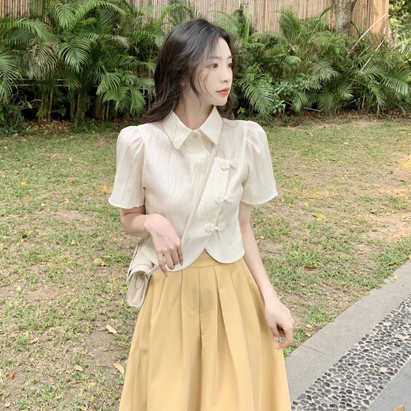 

Irregular short shirt women's summer 2022 new style buckle design feeling very fairy slim short sleeved top