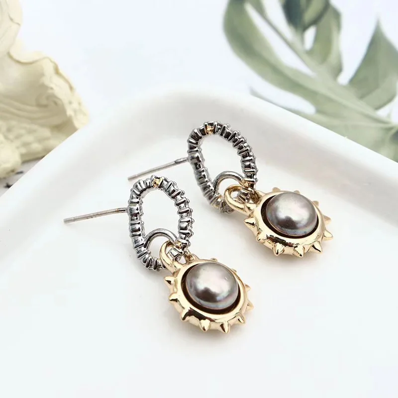 

Genius Designer Trend Metal Texture Geometric Shape Sunflower Earrings
