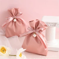 203050pcs pink leather dragee bags wedding favors for guests bulk chocolate candy box for baptism treat children birthday