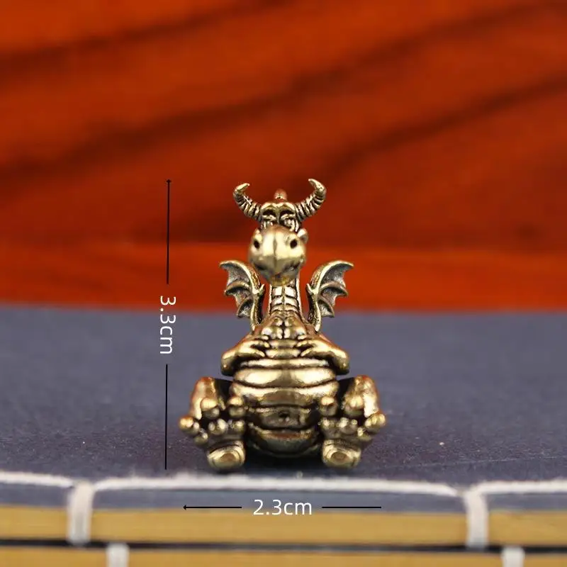 

Статуэтка дракона из латуни TPXCKz