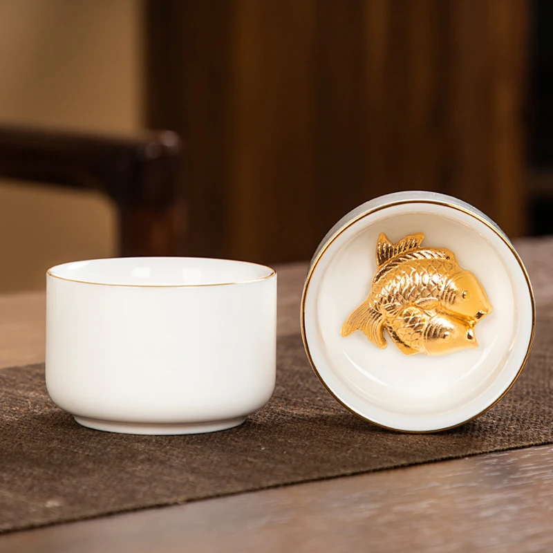 Dehua lanolin jade white porcelain high-end Master Cup inlaid with goldfish tea cup household single couple tea cup set