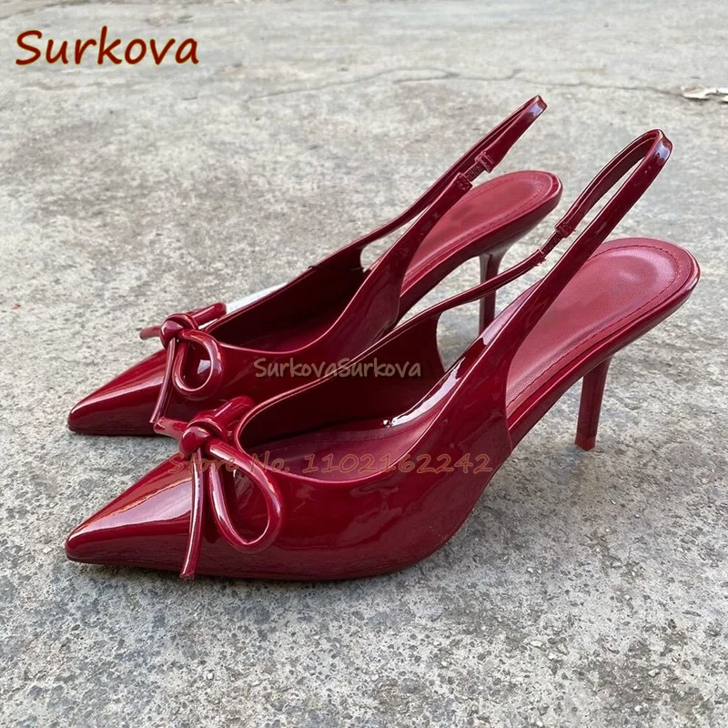 Бордовые туфли-лодочки из лакированной кожи с бантом на высоком каблуке острым