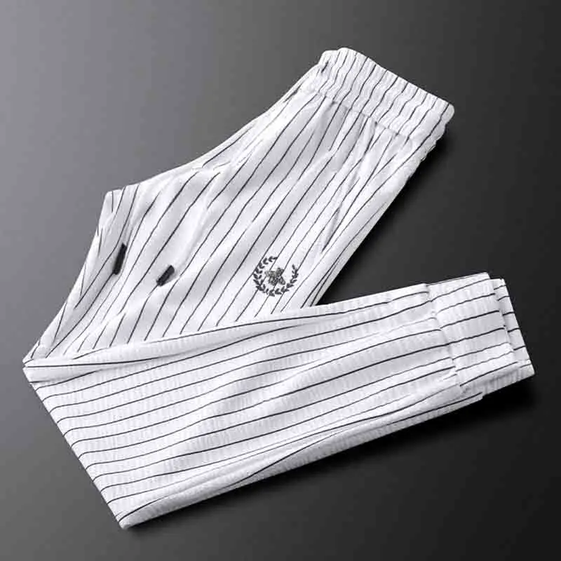 Light luxury quality vertical striped men's casual sports pants summer thin high elastic ice silk sweatpants men