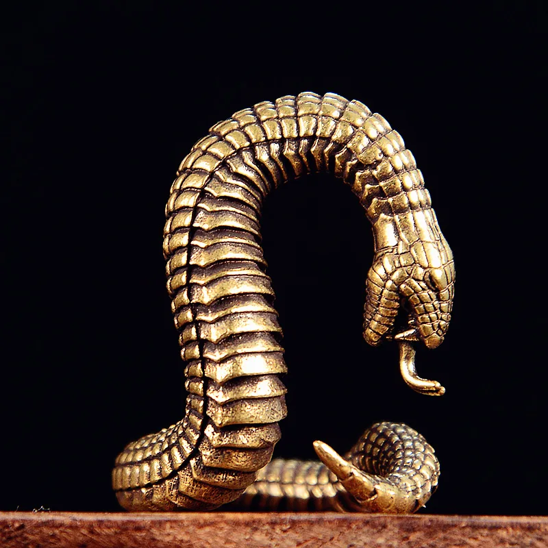 

Латунная статуэтка змеи