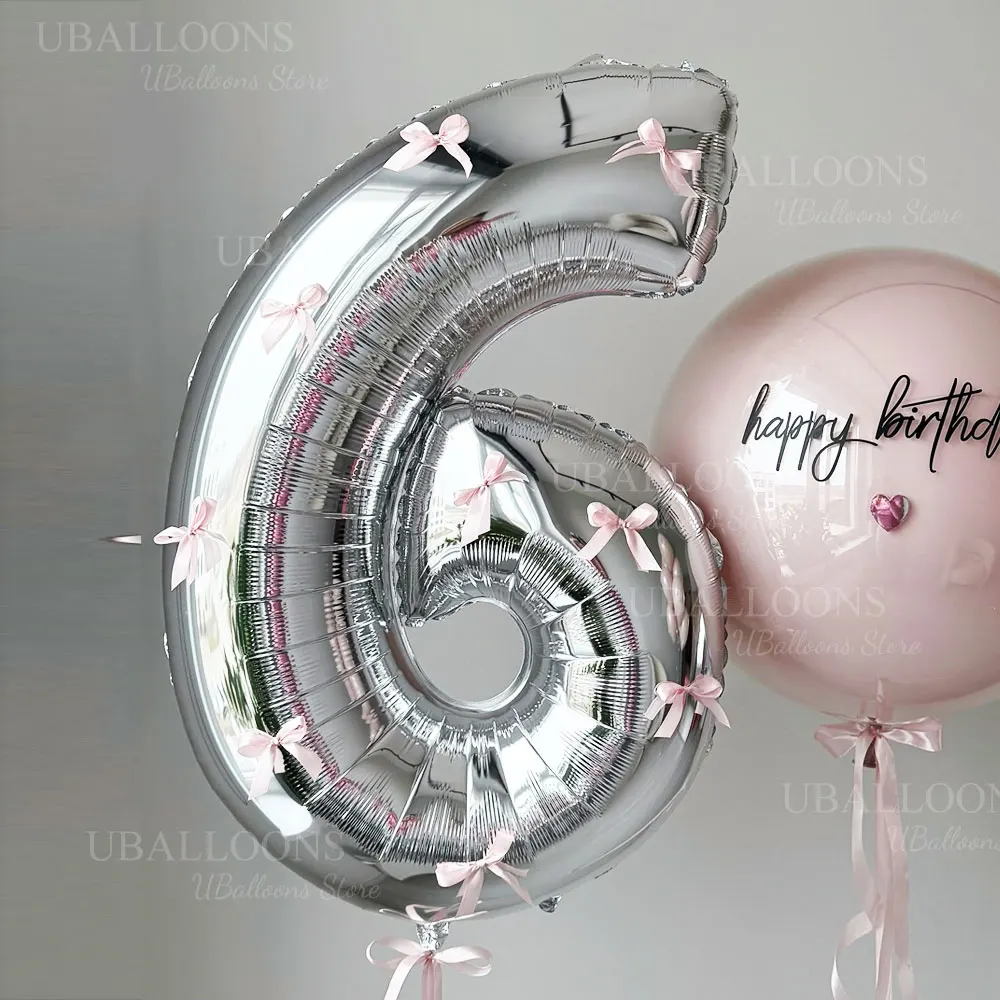 

Серебряные фольгированные шары с розовыми бантами 0-9