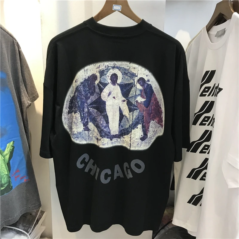 

Высококачественные модные мужские футболки CPFM Kanye с изображением Уэста Иисуса короля 1:1 повседневные женские футболки с рисунком трех бого...