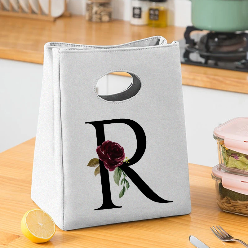 Портативная сумка унисекс для ланча с черными буквами изолированная коробка