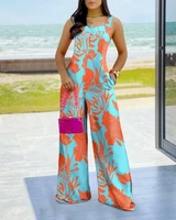 woman chic sweetheart neck botanical print thick strap wide leg jumpsuit with pocket