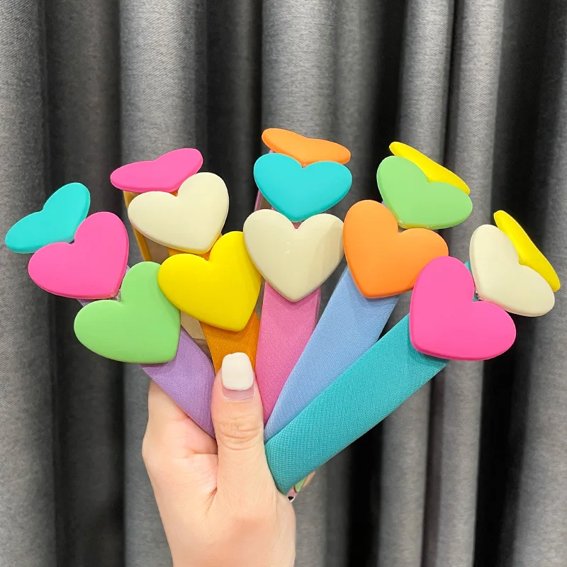 

Новинка 2022, милые универсальные изысканные цветные повязки на голову с сердечками, повязки для волос для девочек, аксессуары для волос, голо...