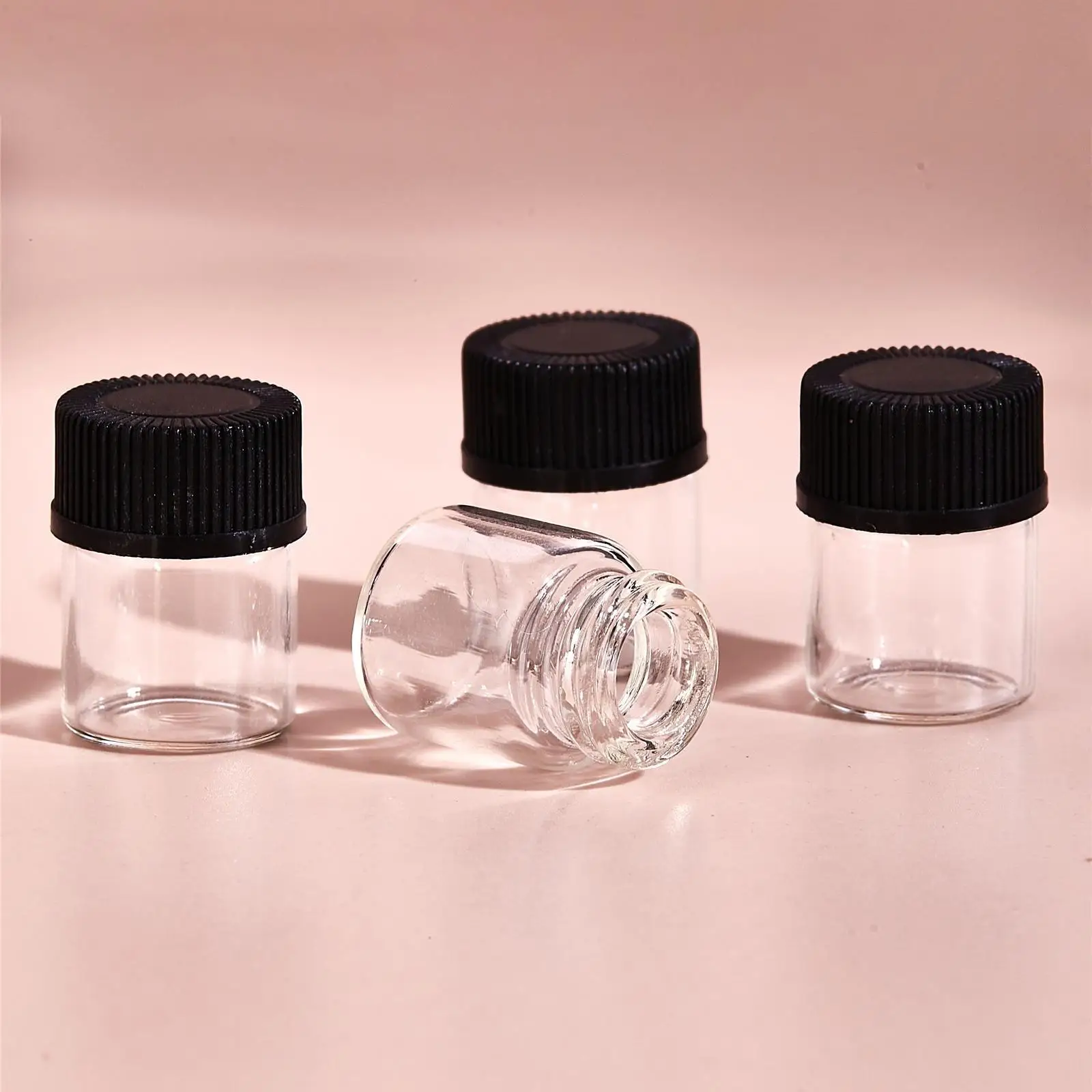 

100Pcs Essential Oil Bottles Refillable with Orifice Reducers for Massage