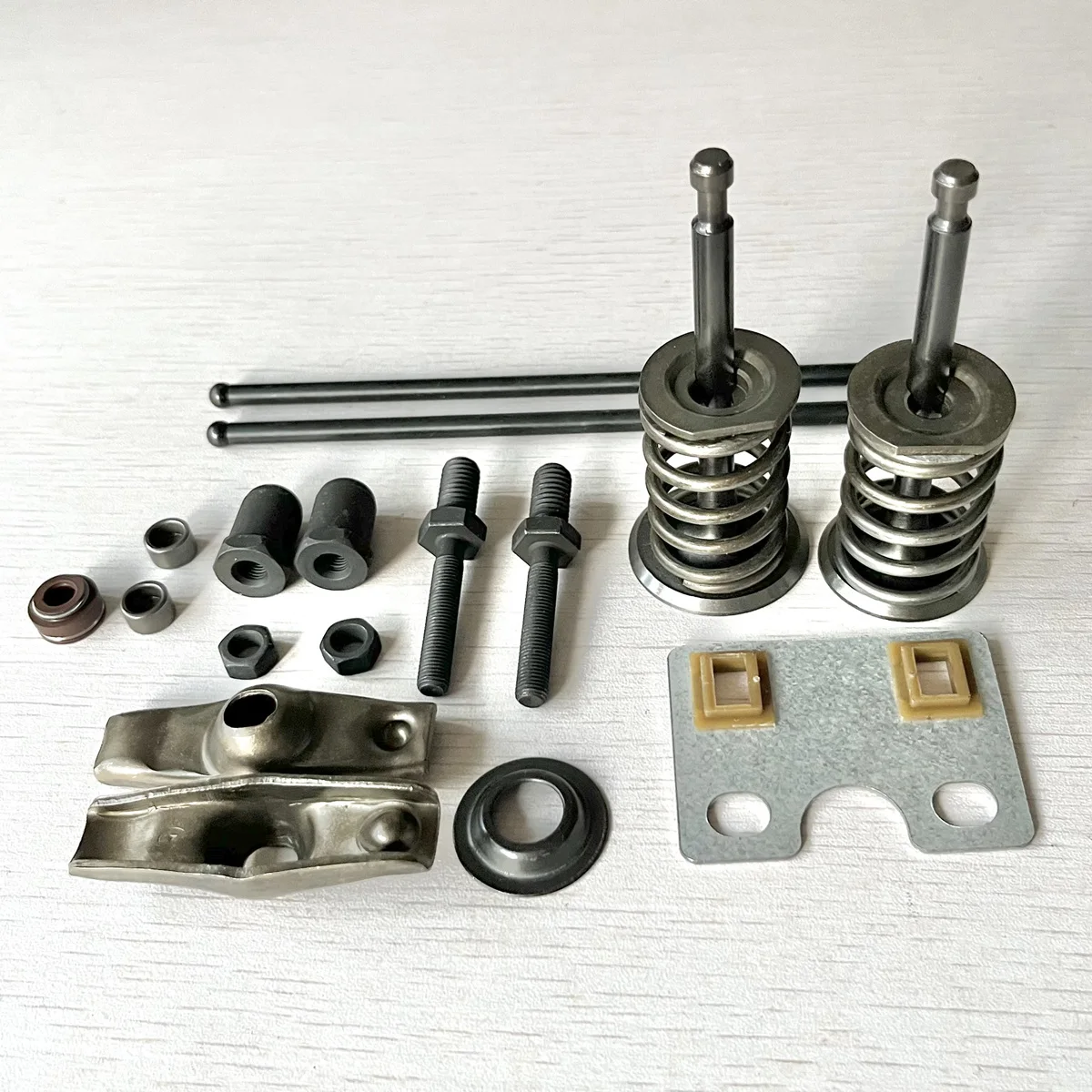 толкатель коромысла мтз-80. направляющая втулка клапана гбц форд эксплорер об. штанга толкателя коромысла клапана, сталь 162fmj (cg150) 6,5х144мм. толкатель коромысла. коромысла форд транзит 2.