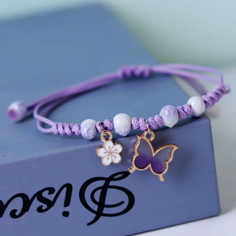 Купи Rinhoo Fashion Handmade Purple Butterfly Flower Bracelet For Women Charm Sweet Animal Pendant Braided Bracelets & Bangle Jewelry за 72 рублей в магазине AliExpress