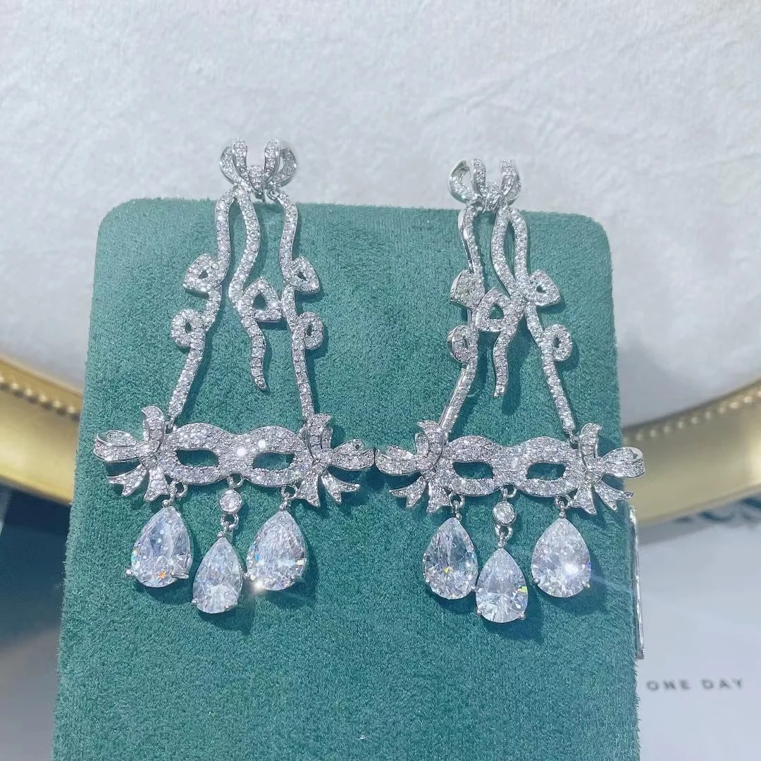 

The new 2022 European wind bow bells eyes water droplets zircon tassels eardrop luxury earrings