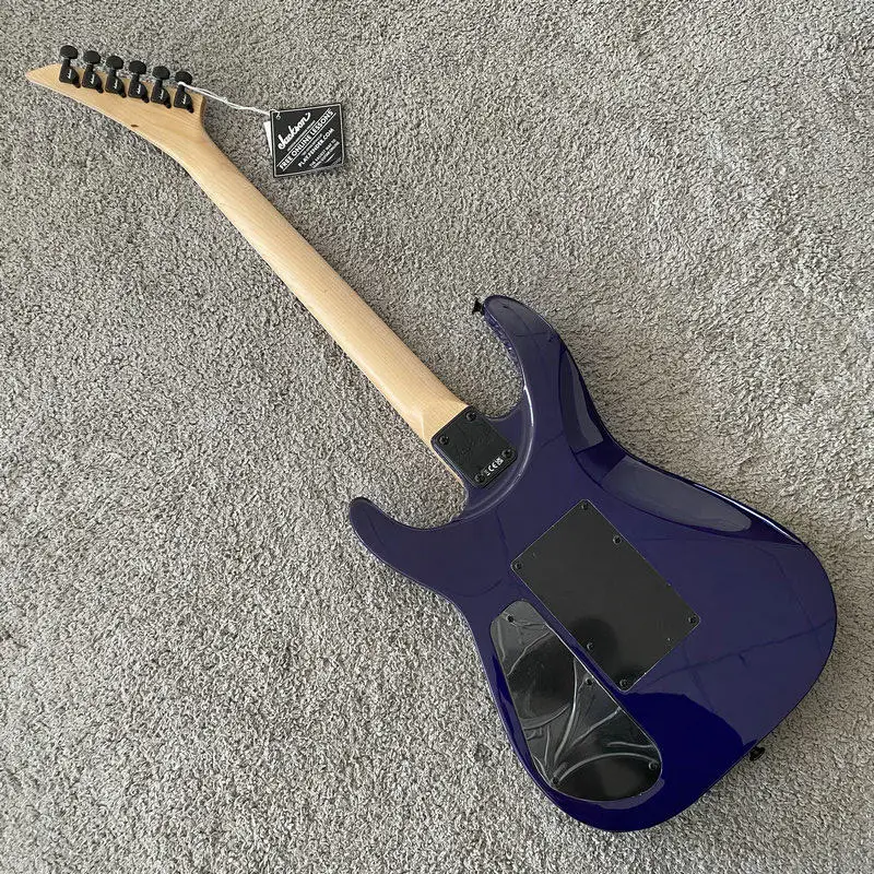 Фото Электрогитара Jackson JS34Q Dinky Arch Top, 24 лада, кленовый гриф, HSS, с рёхолистной декой, тремоло Floyd Rose, прозрачный фиолетовый цвет №5