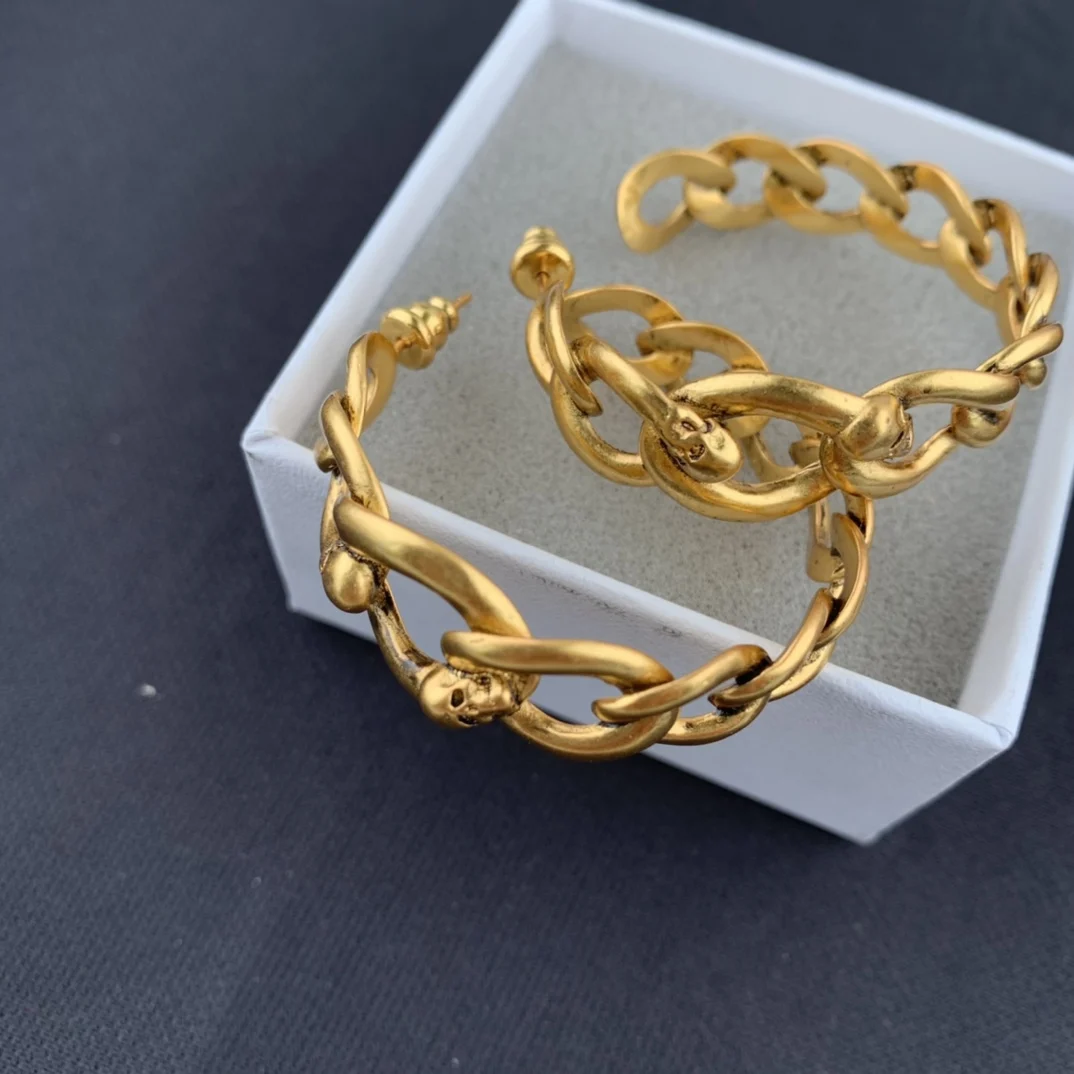 

Витые серьги в виде цепи с жареным тестом