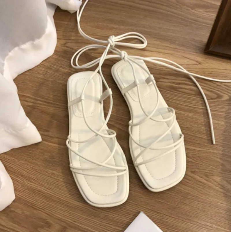 

Сандалии женские с открытым носком, Пляжная модная пикантная обувь на плоской подошве, повседневные туфли с перекрестными шнуровками, сказ...